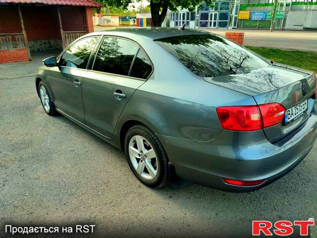 Серый Фольксваген Джетта, объемом двигателя 1.4 л и пробегом 168 тыс. км за 8400 $, фото 1 на Automoto.ua