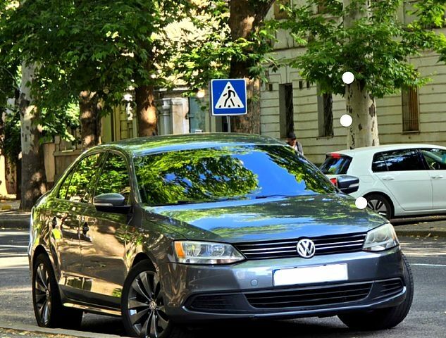 Серый Фольксваген Джетта, объемом двигателя 1.8 л и пробегом 253 тыс. км за 9500 $, фото 1 на Automoto.ua