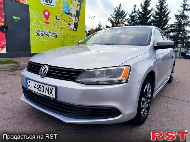 Фольксваген Джетта 2013 в Лубнах на Automoto.ua Серый Фольксваген Джетта, объемом двигателя 2 л и пробегом 260 тыс. км за 6700 $, фото 1 на Automoto.ua