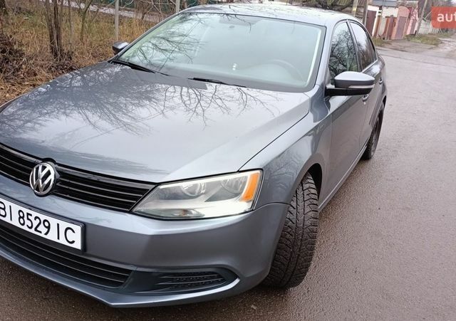 Серый Фольксваген Джетта, объемом двигателя 1.8 л и пробегом 274 тыс. км за 8000 $, фото 1 на Automoto.ua
