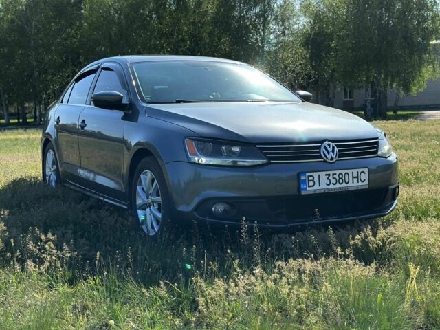 Серый Фольксваген Джетта, объемом двигателя 1.8 л и пробегом 189 тыс. км за 9000 $, фото 1 на Automoto.ua