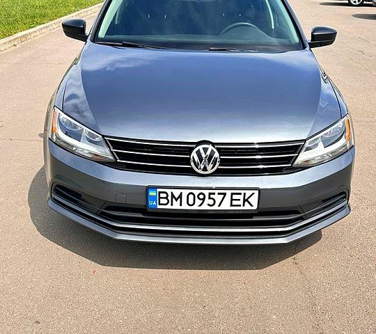Серый Фольксваген Джетта, объемом двигателя 1.4 л и пробегом 127 тыс. км за 10500 $, фото 1 на Automoto.ua