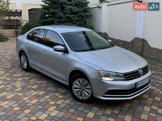 Серый Фольксваген Джетта, объемом двигателя 1.4 л и пробегом 113 тыс. км за 9900 $, фото 1 на Automoto.ua