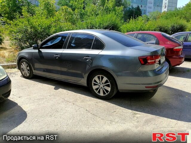 Серый Фольксваген Джетта, объемом двигателя 1.4 л и пробегом 143 тыс. км за 9500 $, фото 1 на Automoto.ua