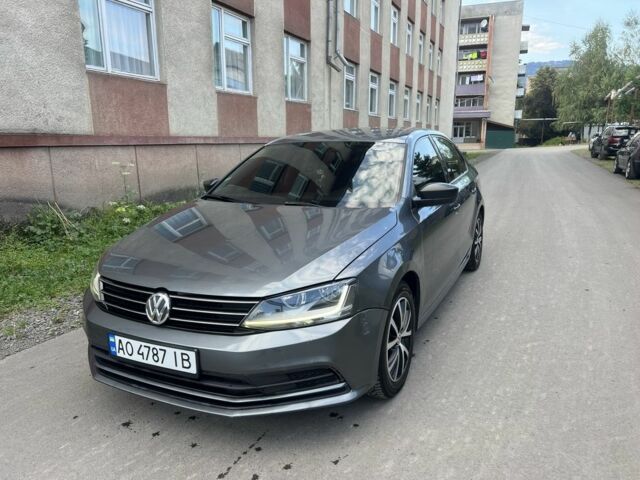 Серый Фольксваген Джетта, объемом двигателя 1.4 л и пробегом 165 тыс. км за 8200 $, фото 1 на Automoto.ua