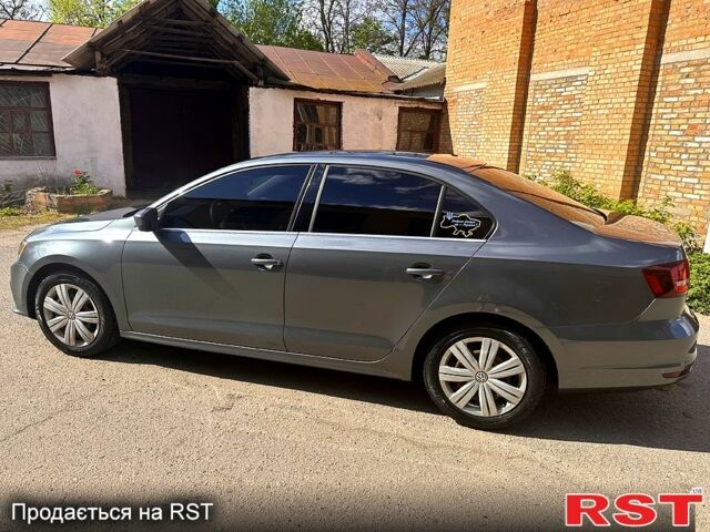 Серый Фольксваген Джетта, объемом двигателя 1.4 л и пробегом 118 тыс. км за 10500 $, фото 1 на Automoto.ua