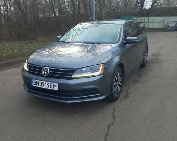 Серый Фольксваген Джетта, объемом двигателя 1.4 л и пробегом 88 тыс. км за 13300 $, фото 1 на Automoto.ua