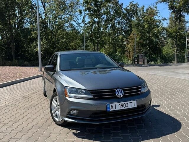 Серый Фольксваген Джетта, объемом двигателя 1.8 л и пробегом 125 тыс. км за 11800 $, фото 1 на Automoto.ua