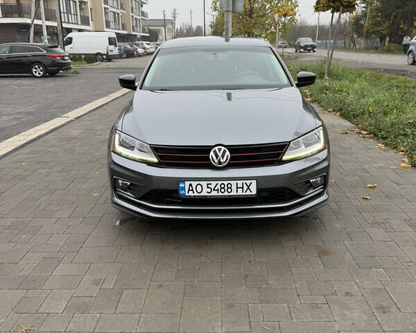 Сірий Фольксваген Джетта, об'ємом двигуна 1.39 л та пробігом 102 тис. км за 12200 $, фото 1 на Automoto.ua