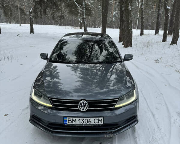 Серый Фольксваген Джетта, объемом двигателя 1.4 л и пробегом 125 тыс. км за 11000 $, фото 1 на Automoto.ua
