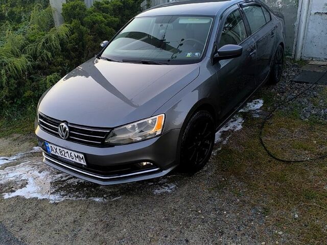 Серый Фольксваген Джетта, объемом двигателя 1.4 л и пробегом 86 тыс. км за 10300 $, фото 1 на Automoto.ua