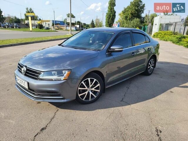 Серый Фольксваген Джетта, объемом двигателя 1.4 л и пробегом 119 тыс. км за 12700 $, фото 1 на Automoto.ua