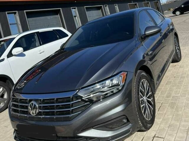 Сірий Фольксваген Джетта, об'ємом двигуна 1.4 л та пробігом 129 тис. км за 14500 $, фото 1 на Automoto.ua