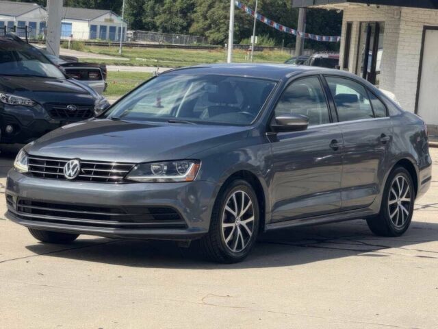 Серый Фольксваген Джетта, объемом двигателя 1.4 л и пробегом 47 тыс. км за 2300 $, фото 1 на Automoto.ua