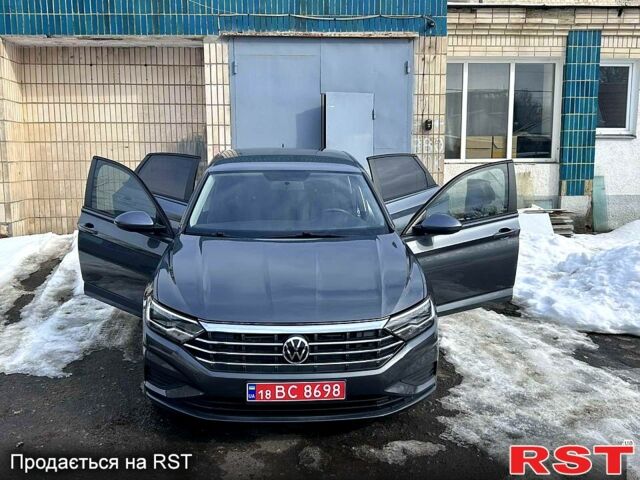 Серый Фольксваген Джетта, объемом двигателя 1.4 л и пробегом 20000 тыс. км за 14500 $, фото 1 на Automoto.ua