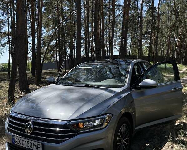 Серый Фольксваген Джетта, объемом двигателя 1.4 л и пробегом 95 тыс. км за 18500 $, фото 1 на Automoto.ua