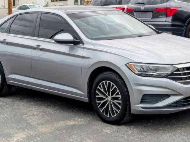 Серый Фольксваген Джетта, объемом двигателя 1.4 л и пробегом 44 тыс. км за 11500 $, фото 1 на Automoto.ua