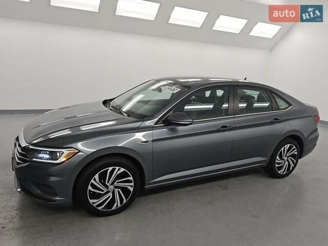 Серый Фольксваген Джетта, объемом двигателя 1.4 л и пробегом 112 тыс. км за 4400 $, фото 1 на Automoto.ua