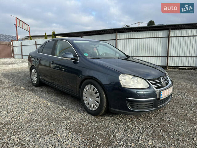 Синий Фольксваген Джетта, объемом двигателя 1.4 л и пробегом 230 тыс. км за 4800 $, фото 1 на Automoto.ua