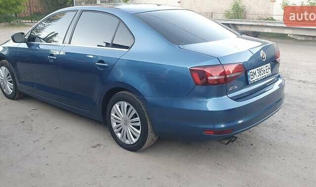Синий Фольксваген Джетта, объемом двигателя 1.4 л и пробегом 130 тыс. км за 9700 $, фото 1 на Automoto.ua