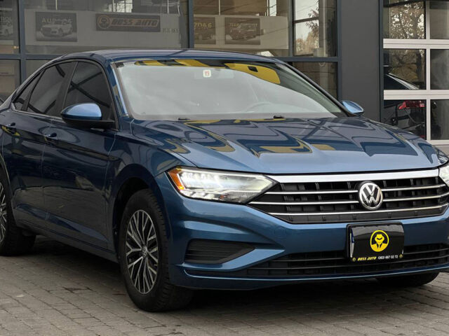 Синий Фольксваген Джетта, объемом двигателя 1.4 л и пробегом 99 тыс. км за 13600 $, фото 1 на Automoto.ua