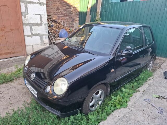 Черный Фольксваген Лупо, объемом двигателя 1 л и пробегом 262 тыс. км за 2500 $, фото 1 на Automoto.ua