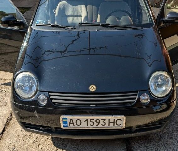 Черный Фольксваген Лупо, объемом двигателя 1.4 л и пробегом 193 тыс. км за 1800 $, фото 1 на Automoto.ua