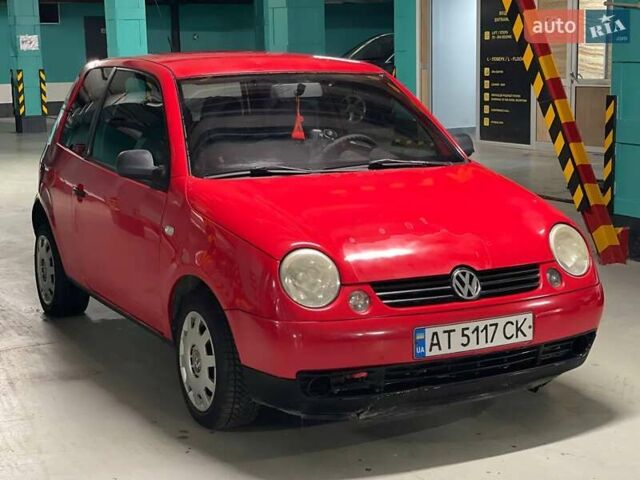 Красный Фольксваген Лупо, объемом двигателя 1 л и пробегом 313 тыс. км за 2400 $, фото 1 на Automoto.ua