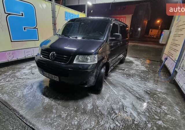 Чорний Фольксваген Мультиван, об'ємом двигуна 2.5 л та пробігом 290 тис. км за 13500 $, фото 1 на Automoto.ua