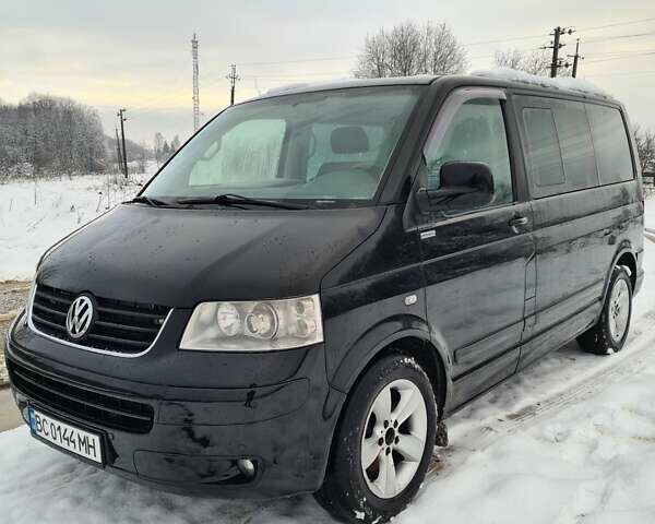 Чорний Фольксваген Мультиван, об'ємом двигуна 2.5 л та пробігом 256 тис. км за 9900 $, фото 1 на Automoto.ua