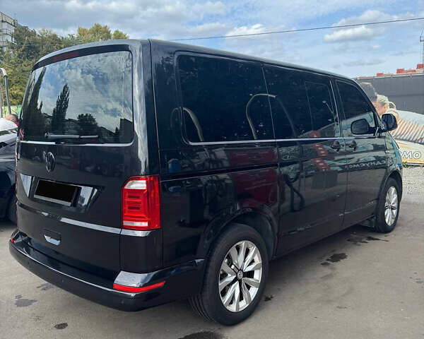 Чорний Фольксваген Мультиван, об'ємом двигуна 2.5 л та пробігом 330 тис. км за 15500 $, фото 1 на Automoto.ua