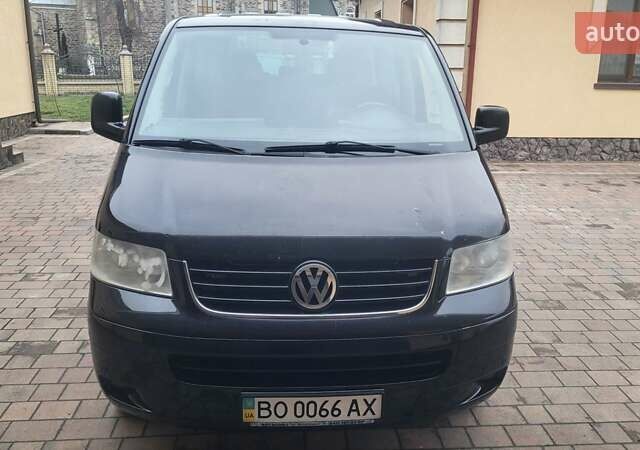 Черный Фольксваген Мультиван, объемом двигателя 3.2 л и пробегом 325 тыс. км за 12000 $, фото 1 на Automoto.ua