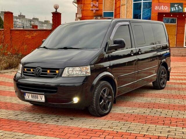 Черный Фольксваген Мультиван, объемом двигателя 2.46 л и пробегом 400 тыс. км за 18500 $, фото 1 на Automoto.ua