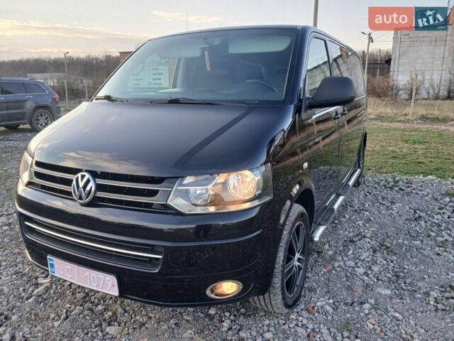 Черный Фольксваген Мультиван, объемом двигателя 2 л и пробегом 187 тыс. км за 23600 $, фото 1 на Automoto.ua