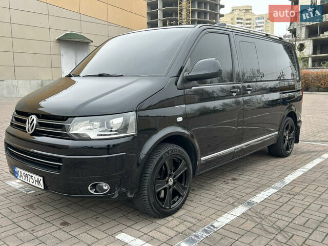 Черный Фольксваген Мультиван, объемом двигателя 1.97 л и пробегом 300 тыс. км за 25000 $, фото 1 на Automoto.ua