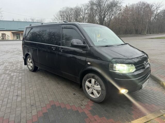Черный Фольксваген Мультиван, объемом двигателя 2 л и пробегом 308 тыс. км за 16400 $, фото 1 на Automoto.ua