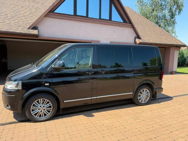 Чорний Фольксваген Мультиван, об'ємом двигуна 2 л та пробігом 330 тис. км за 30000 $, фото 1 на Automoto.ua