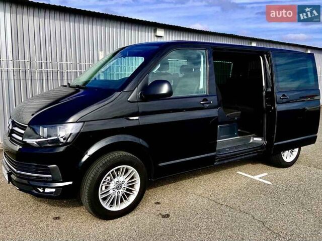 Черный Фольксваген Мультиван, объемом двигателя 2 л и пробегом 243 тыс. км за 24900 $, фото 1 на Automoto.ua
