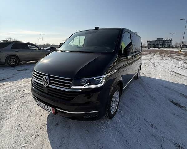 Чорний Фольксваген Мультиван, об'ємом двигуна 2 л та пробігом 73 тис. км за 59980 $, фото 1 на Automoto.ua