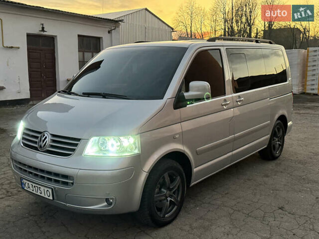 Сірий Фольксваген Мультиван, об'ємом двигуна 2.5 л та пробігом 290 тис. км за 8950 $, фото 1 на Automoto.ua