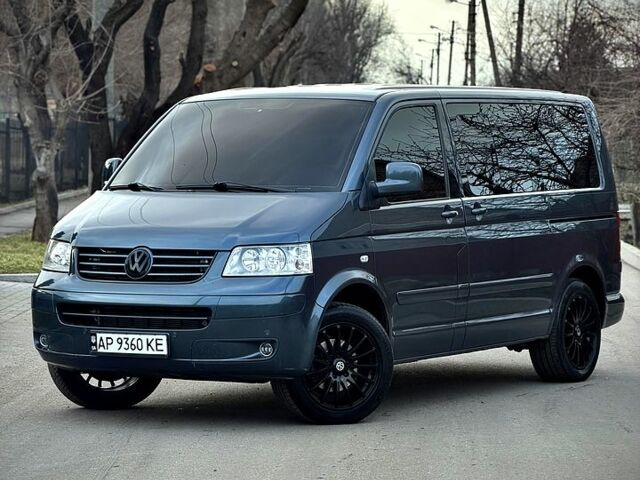 Сірий Фольксваген Мультиван, об'ємом двигуна 2.5 л та пробігом 320 тис. км за 14500 $, фото 1 на Automoto.ua