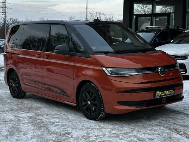 Помаранчевий Фольксваген Мультиван, об'ємом двигуна 2 л та пробігом 87 тис. км за 63800 $, фото 1 на Automoto.ua