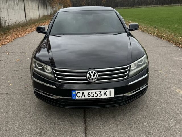 Черный Фольксваген Фаетон, объемом двигателя 3 л и пробегом 300 тыс. км за 13000 $, фото 1 на Automoto.ua