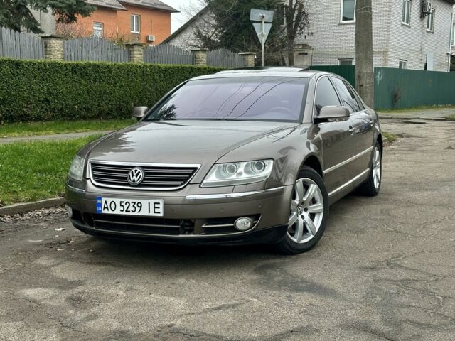 Коричневый Фольксваген Фаетон, объемом двигателя 4.2 л и пробегом 234 тыс. км за 5200 $, фото 1 на Automoto.ua