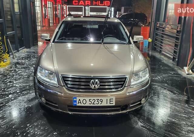 Коричневый Фольксваген Фаетон, объемом двигателя 4.2 л и пробегом 234 тыс. км за 8500 $, фото 1 на Automoto.ua