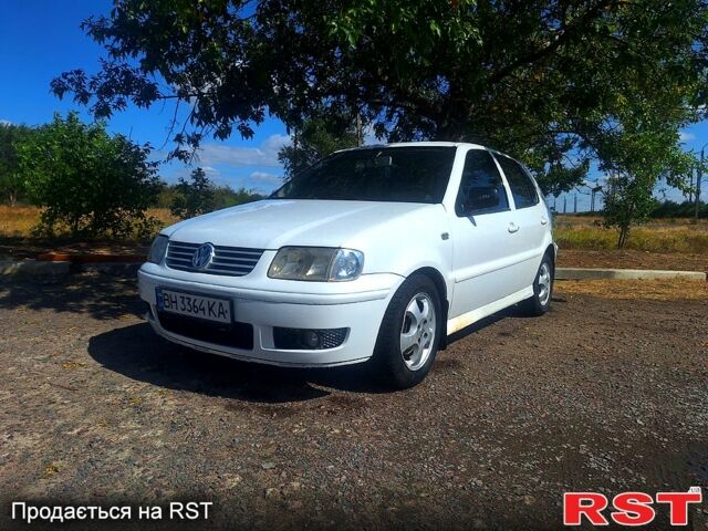 Белый Фольксваген Поло, объемом двигателя 1.4 л и пробегом 190 тыс. км за 1999 $, фото 1 на Automoto.ua