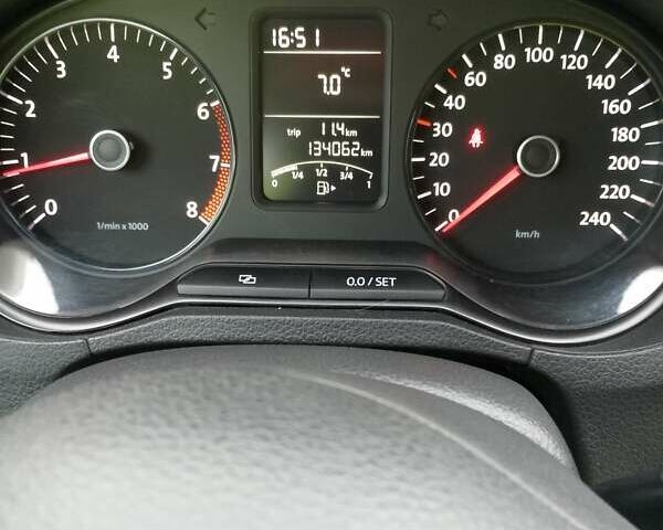 Білий Фольксваген Поло, об'ємом двигуна 1.2 л та пробігом 136 тис. км за 7000 $, фото 1 на Automoto.ua