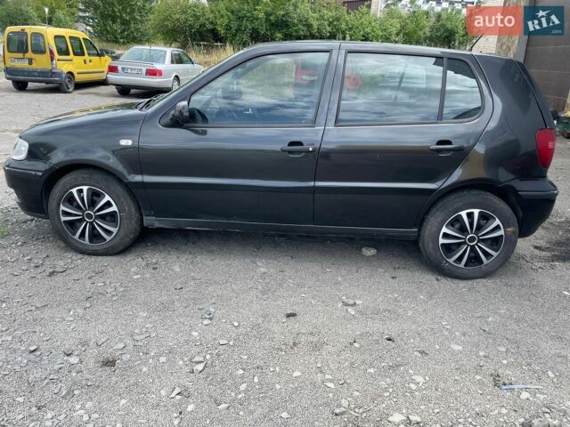 Черный Фольксваген Поло, объемом двигателя 1 л и пробегом 376 тыс. км за 2500 $, фото 1 на Automoto.ua
