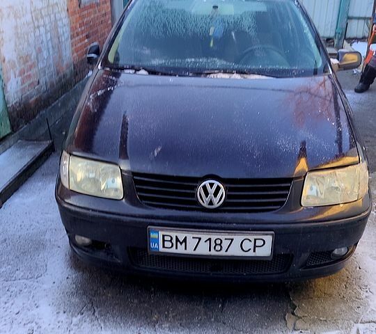 Черный Фольксваген Поло, объемом двигателя 1.4 л и пробегом 200 тыс. км за 1300 $, фото 1 на Automoto.ua