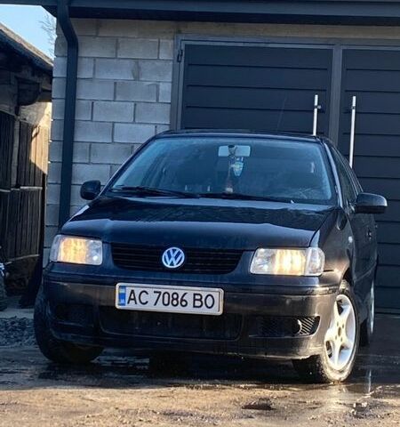 Чорний Фольксваген Поло, об'ємом двигуна 1.39 л та пробігом 250 тис. км за 1750 $, фото 1 на Automoto.ua